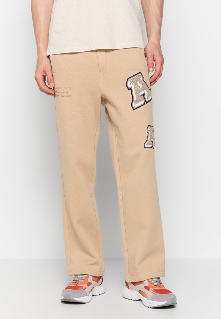 Axel Arigato Trainingsbroek zandkleur Axel Arigato Trainingsbroek zandkleur