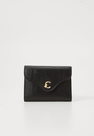 Black textured leather wallet with a gold intertwined "CC" logo on the front flap, set against a plain white background.