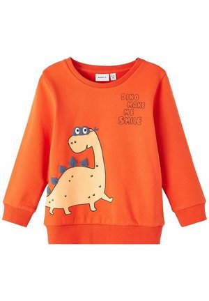 Sudadera naranja para niños con un dinosaurio de dibujos animados sonriente y el texto "Dino make me smile" en el frente.