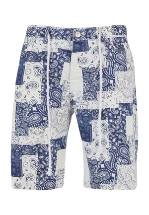 Sinine ja valge mustriga ujumispüksid, millel on segu paisley ja geomeetrilistest kujunditest. Pükstel on elastne vöökoht ja kinnitusnöör.