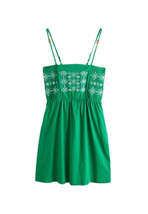 Rochie verde fără mâneci cu bretele subțiri, având broderie geometrică albă și aplicații argintii pe corsetul strâmt.