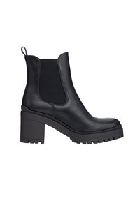 Svart läderankelboots med elastiska sidopaneler, kraftig klack och texturerad sula. Har en dragflik för enkel på- och avtagning.