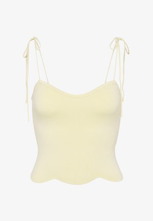 Top corto in maglia a coste color crema con spalline regolabili da legare e orlo smerlato.