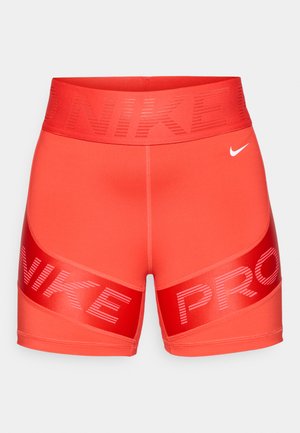 Nike Performance SCULPT - Leggings - light crimson/habanero red/white