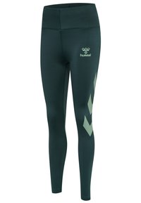 Mørkegrønne leggings lavet af elastisk materiale. Har en lysegrøn logo og chevronmønster på venstre ben. Høj talje design.