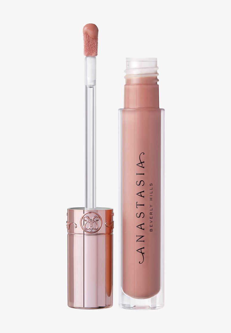 Vloeibare lipkleur in een transparante tube met een zachte roze tint. Heeft een zachte applicator en een metallic roségouden dop met een bloemmotief.