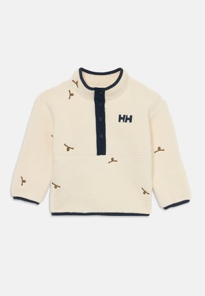 Pullover in pile color crema con colletto e bottoni blu scuro, arricchito da dettagli ricamati in marrone. Include un logo sul petto.