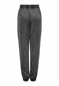 Mörkgrå joggerbyxor med elastisk midja och ribbstickade avslut. Tyget är slätt med en lätt strukturerad yta. Minimalistisk design utan ytterligare detaljer.