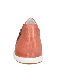 Perforated orange leather slip-on shoe with a white sole and a decorative silver zipper on the side. Smooth texture, rounded shape.