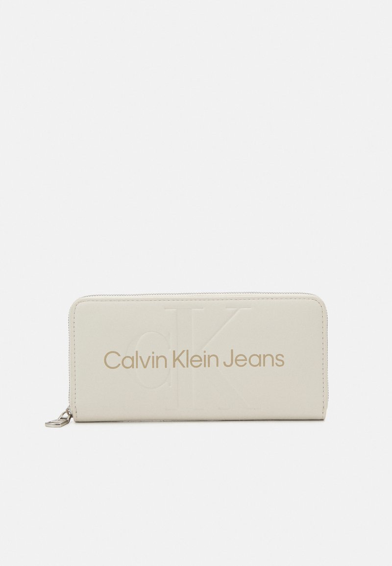 Calvin Klein Jeans SCULPTED ZIP AROUND MONO - Peňaženka - eggshell