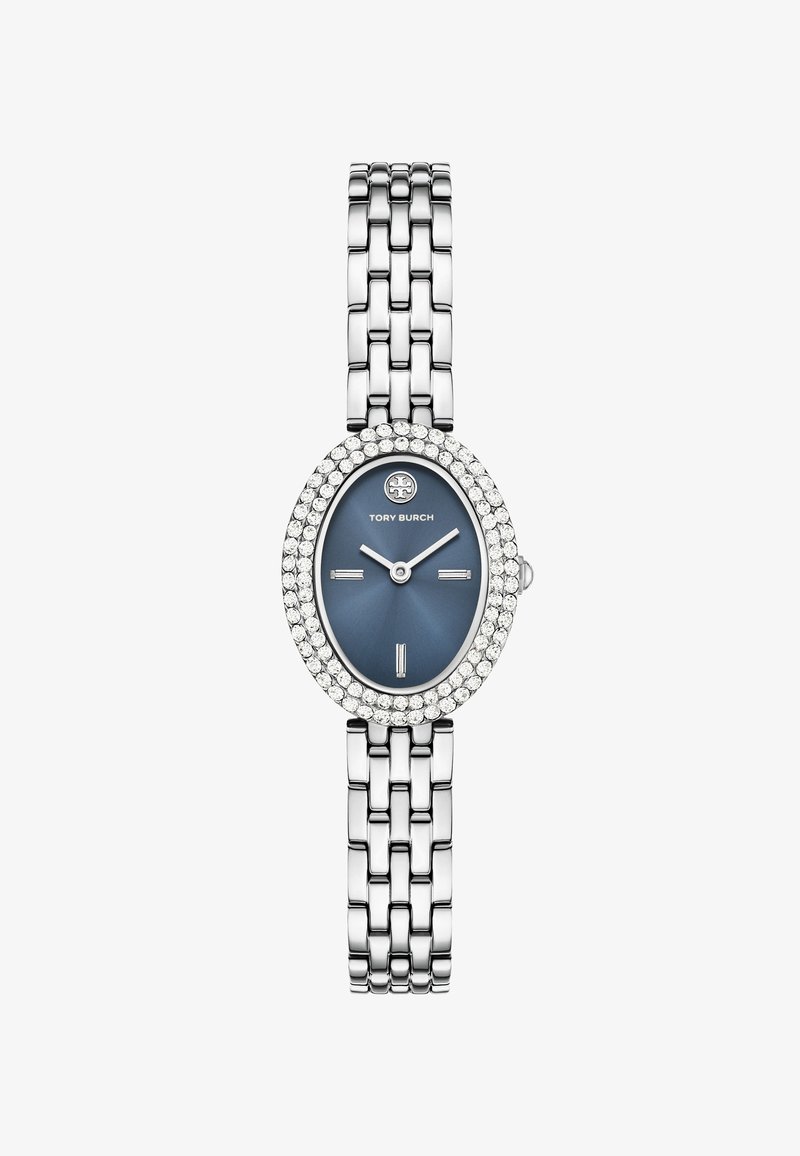 Hopeakuvioinen kello sinisellä ovaalilla kellotaululla, jota ympäröi kirkkaista kristalleista valmistettu kehys, sekä metallinen ketjumuotoinen ranneke.