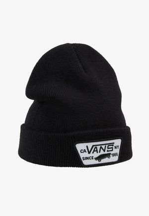 Gorro de punto negro con puño doblado. Presenta una etiqueta blanca con "CA VANS NY" y un gráfico de patineta. Está hecho de un material suave y texturizado.
