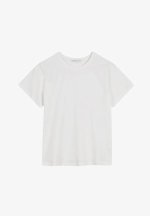 Biała bawełniana koszulka z okrągłym dekoltem i krótkimi rękawami. Miękka struktura, regularny krój, bez widocznych wzorów i akcentów.