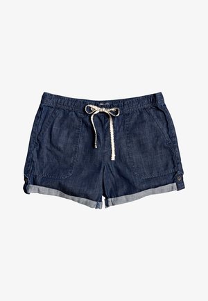 Shorts en denim bleu foncé avec revers roulés, poches avant et un cordon blanc noué en nœud papillon à la taille élastique.