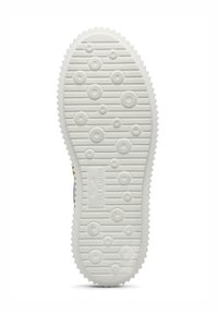 White rubber sole with a textured pattern featuring circles and grooves, designed for traction. The edge is serrated for grip.