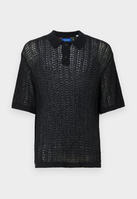 Mustapaitainen lyhythihainen polo, jossa on kudottu rakenne, kaulus, napit ja ribatut hihat. Valmistettu kevyestä materiaalista.