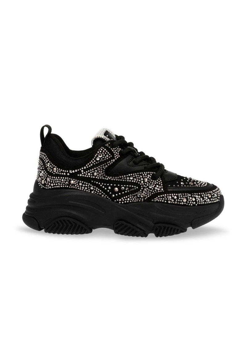 Sneaker nera con tomaia in tessuto texturizzato decorata con strass argento. Suola spessa con un motivo rigato per la trazione.