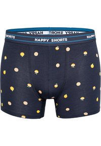 Marineblauwe boxershorts met een zachte structuur, voorzien van een patroon van gele sinaasappels en gesneden sinaasappels. Elastische tailleband met het logo "HAPPY SHORTS".