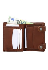 Brown leather wallet open with several white cards in slots and a 100 euro banknote partially visible in cash compartment.