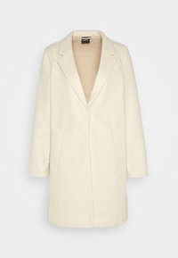 Crèmekleurige, knielange jas met een notch lapel, lange mouwen en twee voorzakken. Zachte stof met minimale textuur en strakke lijnen.