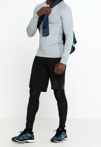 Salomon Trikoot - black