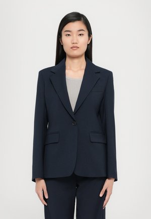 Marineblazer mit einem einzelnen Knopfverschluss, Reverskragen und zwei vorderen Taschen, aus einem glatten, einfarbigen Stoff gefertigt.