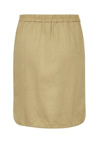 Jupe beige longueur genou avec une ceinture élastique, fabriquée dans un tissu léger. Caractérisée par une texture lisse et un ourlet arrondi.