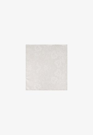 Jasnobeżowy kwadrat z tkaniny z delikatnymi wzorami paisley i kwiatowymi w nieco ciemniejszych beżowych odcieniach.