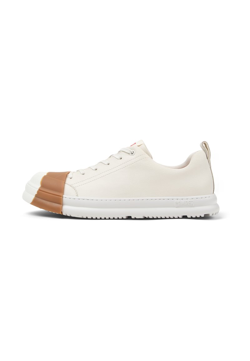 White sneaker with a brown rubber toe cap, smooth leather upper, flat laces, and white rubber soles. Subtle branding on the side.