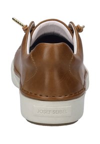 Brown leather sneaker with a low cut, padded collar, white rubber sole, and embossed branding on the heel. Smooth texture and minimal design.