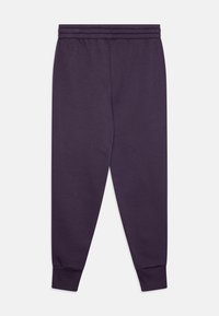 Violet spalvos sportinius kelnes, pagamintas iš minkštos medvilnės mišinio. Ypatybės: elastinga juosta liemens srityje ir siaurėjantys rankogaliai ties kulkšnimis, užtikrinantys patogią prigludimą.