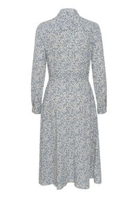Abito con stampa floreale, maniche lunghe e colletto, caratterizzato da una vita aderente e gonna svasata, realizzato in tessuto blu e crema.