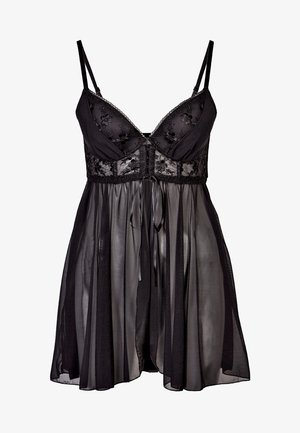 Lingerie noire avec un tissu transparent et fluide. Détails brodés sur le bustier, bord en dentelle et bretelles ajustables. Présente un lien à la taille.
