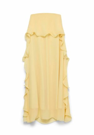 Robe jaune pâle sans bretelles avec des détails de volants en cascade le long des côtés et de l'ourlet, tissu fluide, longueur au genou.