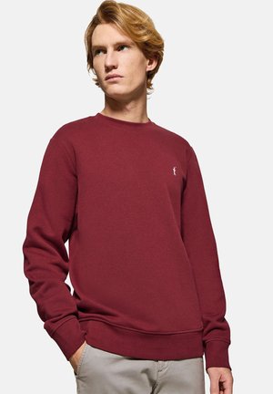 Sudadera burdeos hecha de mezcla de algodón, con cuello redondo acanalado, mangas largas y un pequeño logo bordado en el pecho.