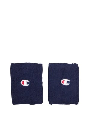 Coppia di polsini in spugna blu navy con logo Champion ricamato bianco, rosso e blu centrato su ogni fascia.