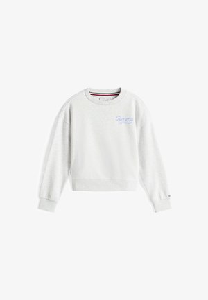 Sweat-shirt gris clair avec des poignets et un ourlet côtelés, affichant un petit logo "Tommy" brodé en bleu clair sur la poitrine.