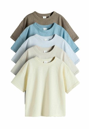 Five plain short-sleeve crewneck t-shirts stacked, colors from front to back: cream, beige, light blue, sky blue, and brown.