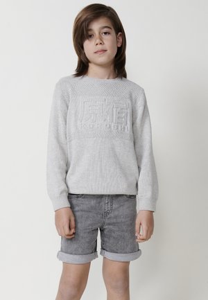 Stickad tröja - crudo off white