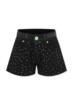 Pantaloni neri corti con vestibilità slim, caratterizzati da un motivo a pois argentati, tasche frontali e un bottone verde con un sorriso decorativo.