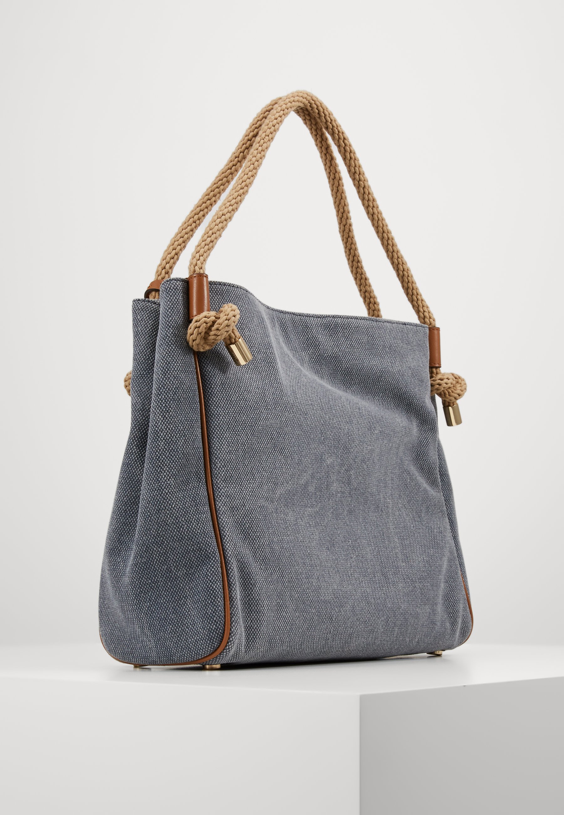 navy grab handbag