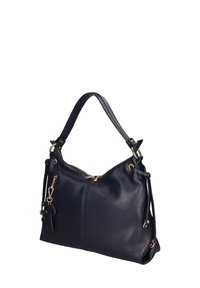 Marine leren handtas met een textuurafwerking, voorzien van een enkele gebogen handgreep, gouden hardware en zijkoorddetails.