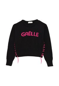 Maglione corto nero con testo in maglia rosa "GAËLLE". Presenta lacci laterali con accenti rosa e un colletto e un orlo a coste.