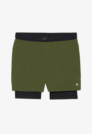 Pantalones cortos verdes con una cinturilla elástica negra, que cuentan con un cierre frontal y una capa interior. Textura suave con un detalle de marca mínimo.