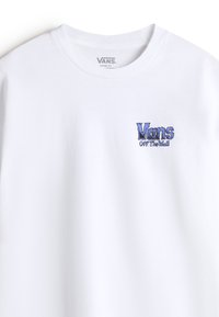 White short-sleeve t-shirt made of cotton, featuring a blue embroidered Vans logo on the left chest. Loose fit design.