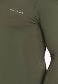 Endurance FUNKTION JARO M SEAMLESS MIDLAYER - Langærmet T-shirt - rosin