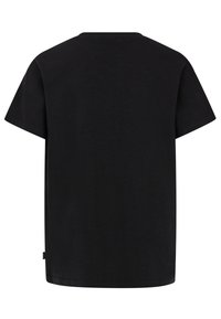Camiseta de algodón negra con un corte relajado, mangas cortas y escote redondo, sin logotipos ni patrones visibles.