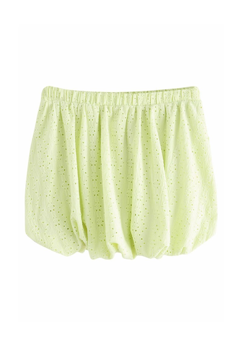 Haut en tissu vert clair avec ceinture élastique, présentant un motif à œillets texturé et un design lâche et froncé.