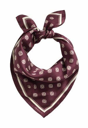 Zijdeachtige kastanjebruine bandana met witte Keltische knoopmotieven en een witte dubbele rand, bovenaan in een knoop gebonden.