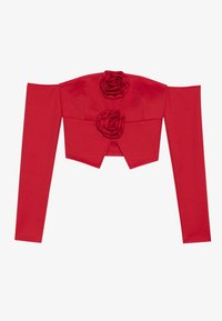Red cropped top with off-shoulder long sleeves. Features three fabric roses on the front. Made from a smooth, stretchy material.